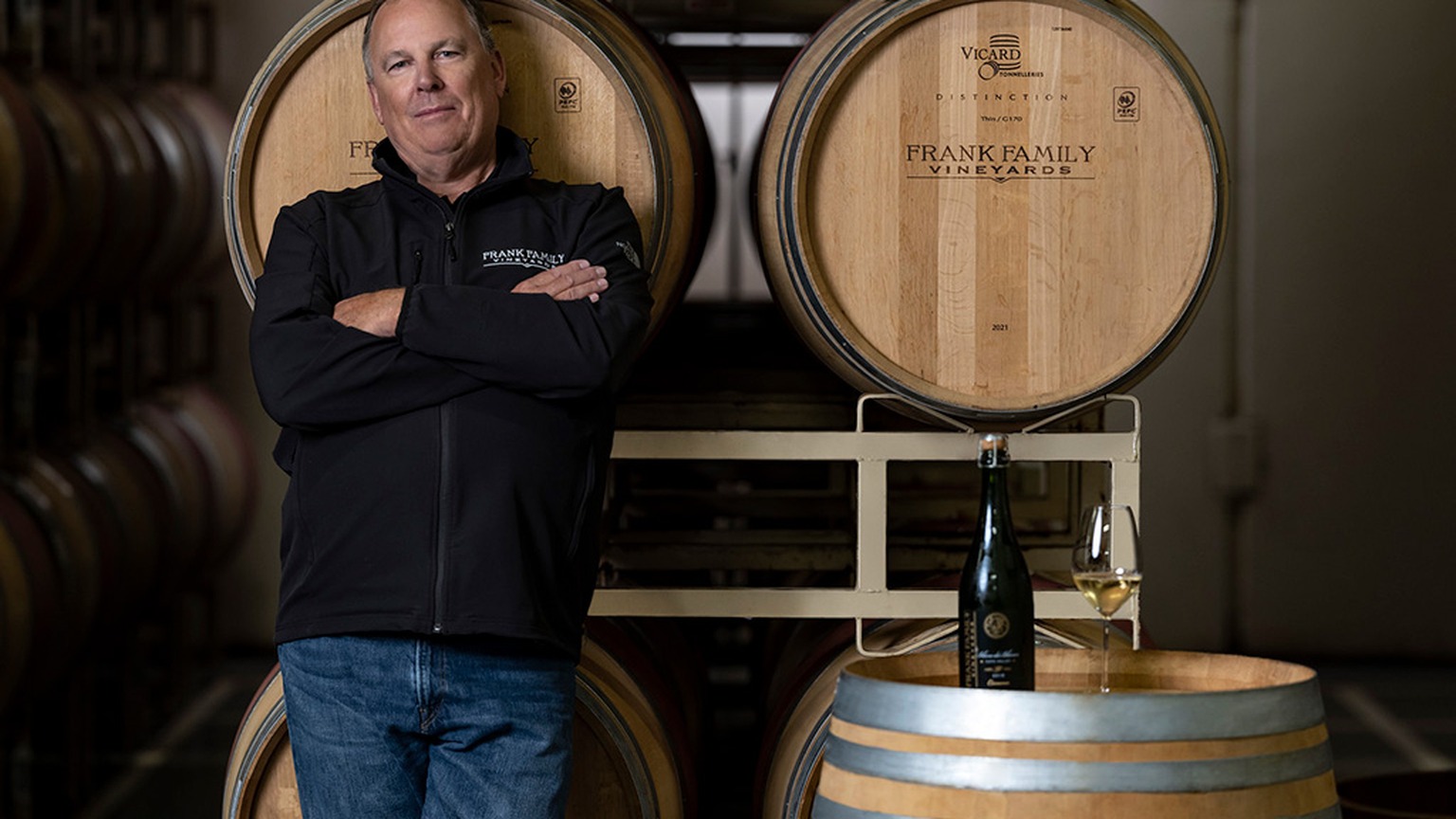 Todd Graff, winemaker at Frank Family Vineyards, among the barrels