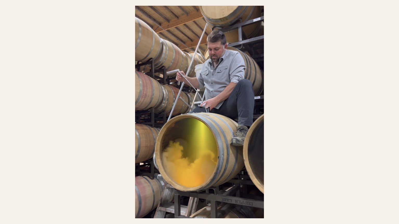 Joe Wagner sampling a barrel in the Copper Cane cellar. The juice is not identified as this Chardonnay.