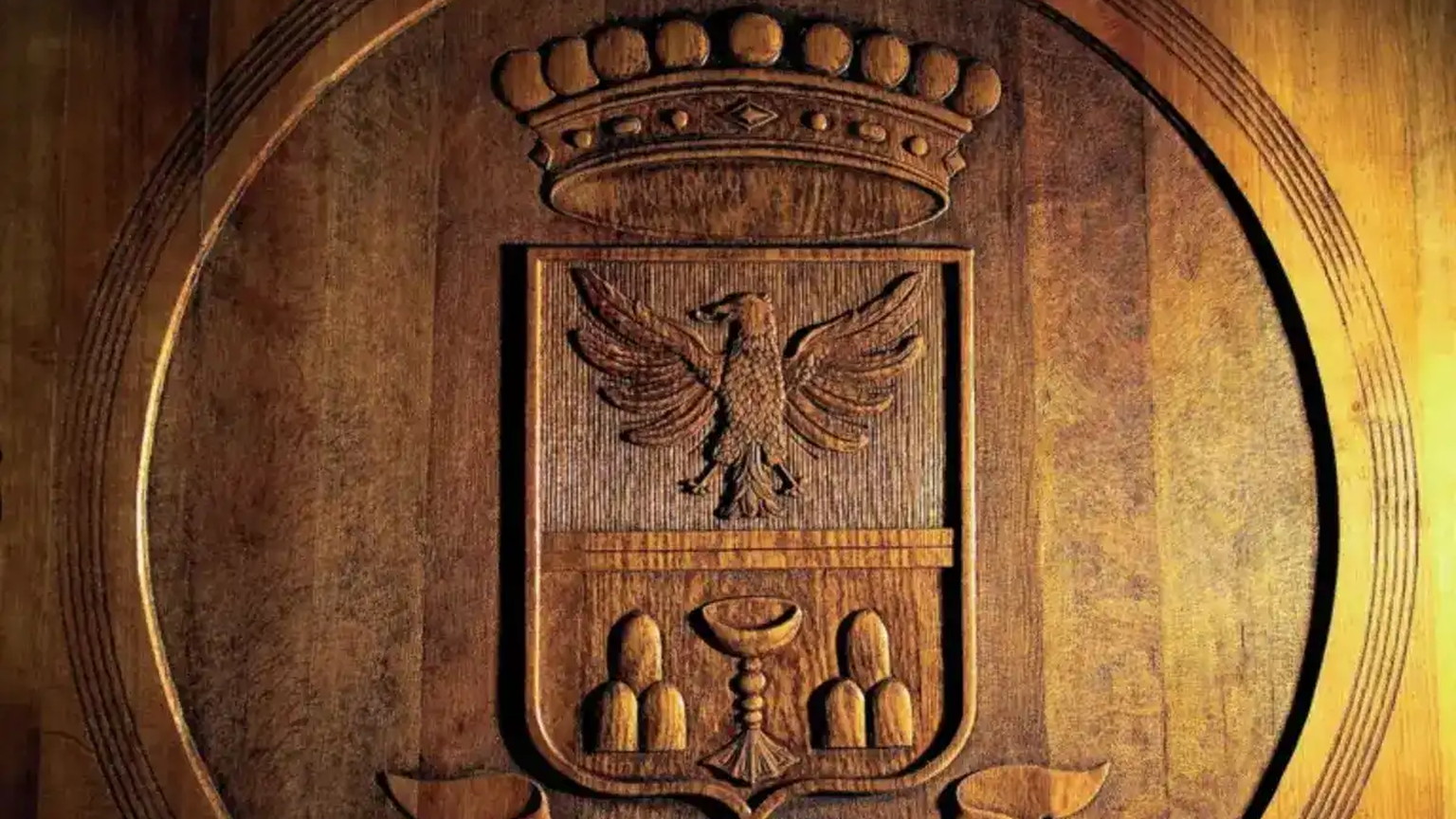 A Banfi barrel head with the estate crest