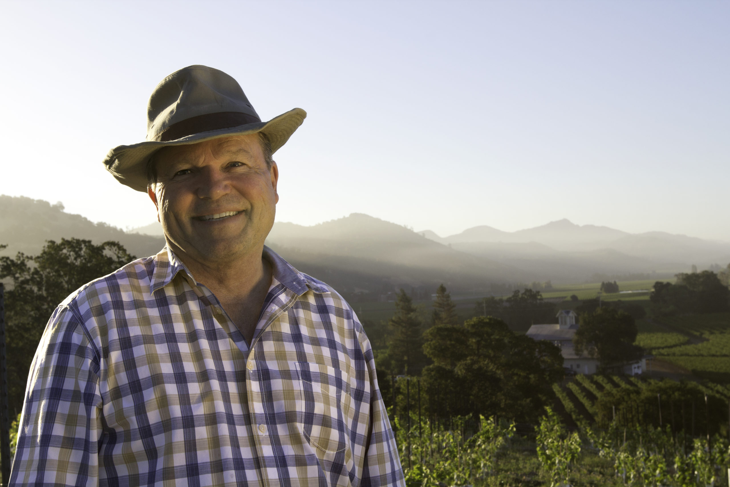 Chuck Wagner standing in a California vineyard