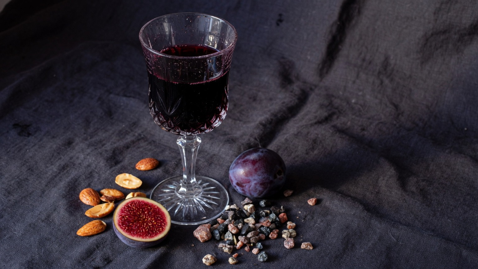 Dense Cabernet in crystal with plum, fig, and almonds