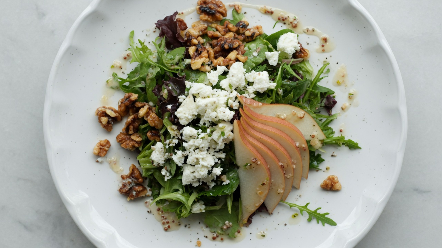 Goat cheese, pear, and walnut salad, food pairing image