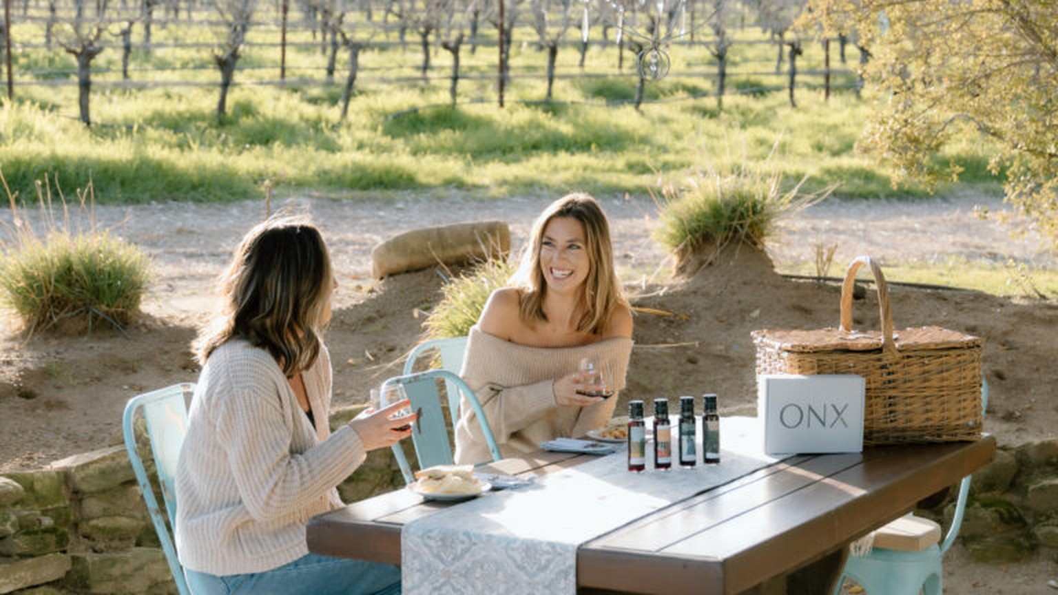 ONX estate picnic in the Templeton Gap vines with the ONX table sign