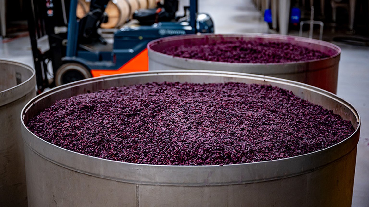 Open fermenters of red must at Opus One