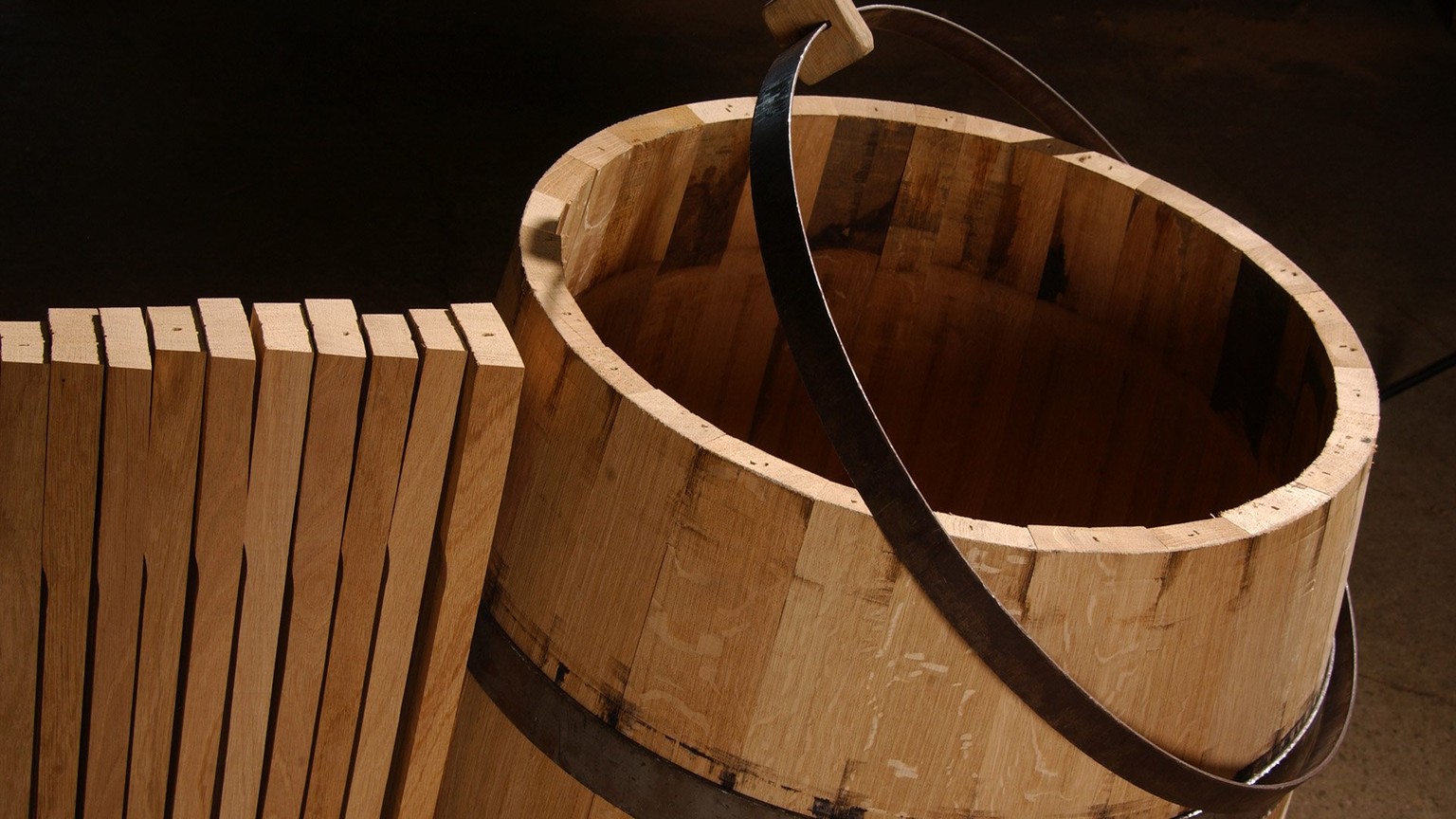 A barrel being raised in the Louis Latour cooperage