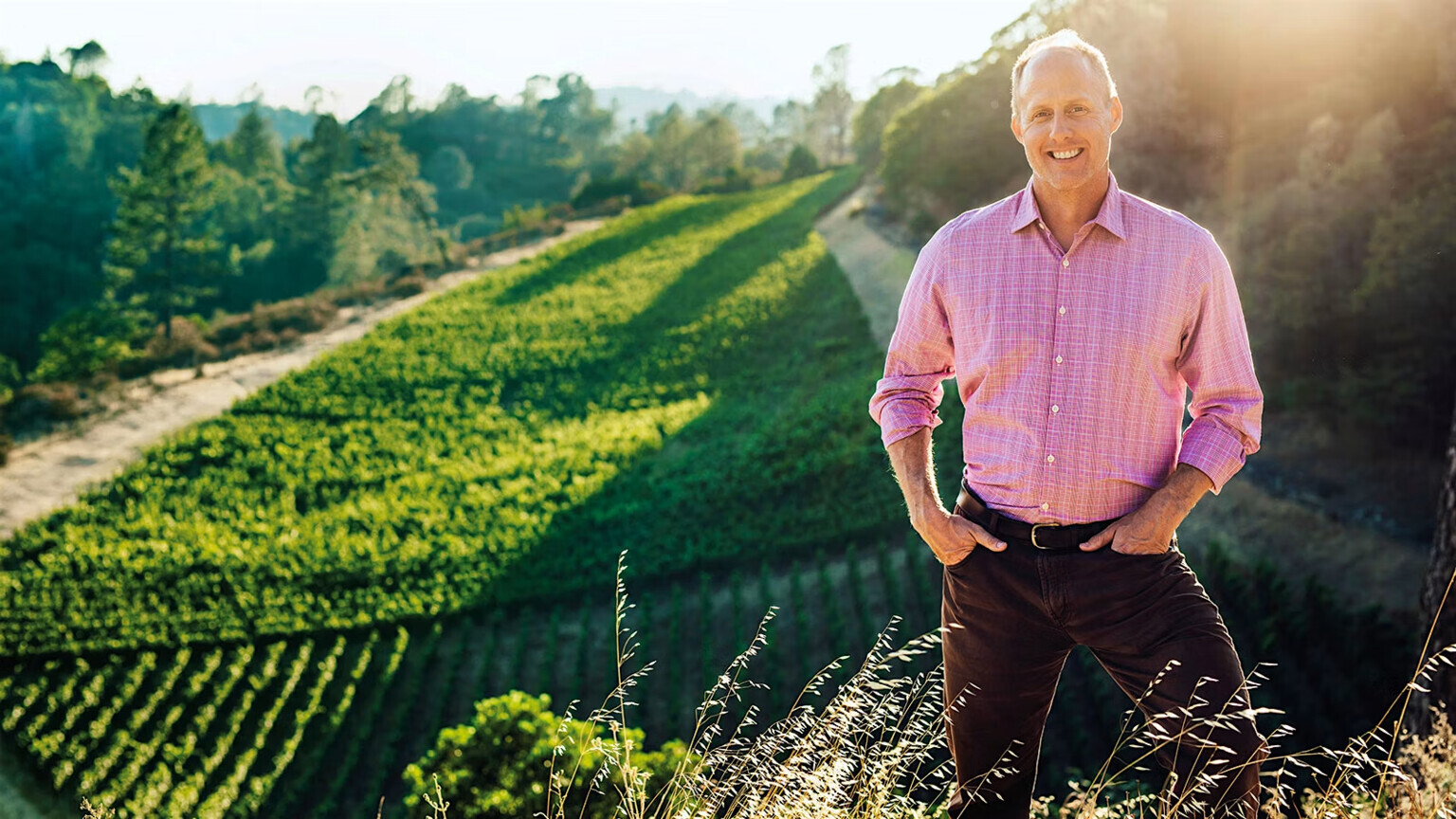 Winemaker Thomas Rivers Brown standing above a Napa Valley vineyard
