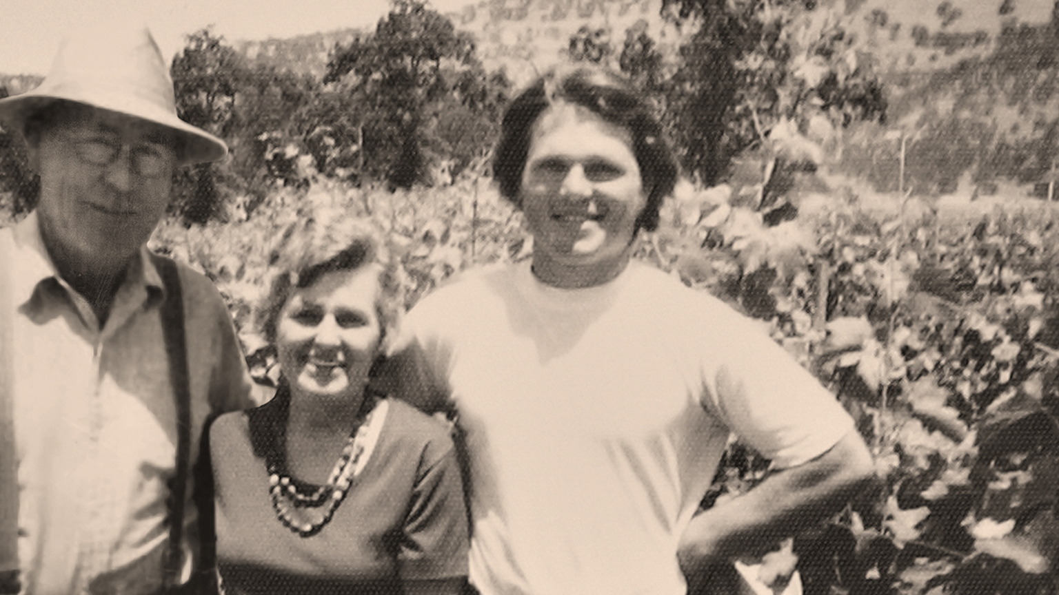 Charlie Wagner Sr., Lorna Wagner, and Chuck Wagner in the vineyard