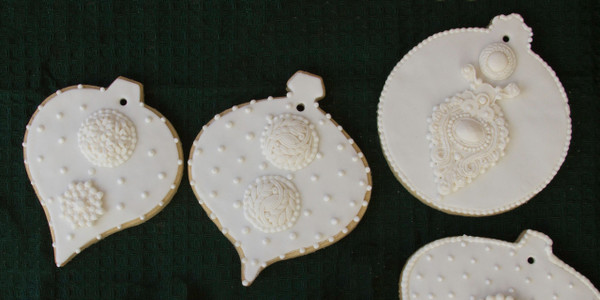Decorated cookies by Judith Dunbar.  Round ornament shown with our ornament T and N (sold separately)  Judithdunbar.com