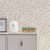 Next Calm Ditsy Floral Cream Wallpaper - 122882_ROOMSET_CALM DITSY FLORAL CREAM_01.jpg