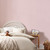 Next Calm Stripe Pink Wallpaper - 122886_ROOMSET_CALM STRIPE PINK_01.jpg
