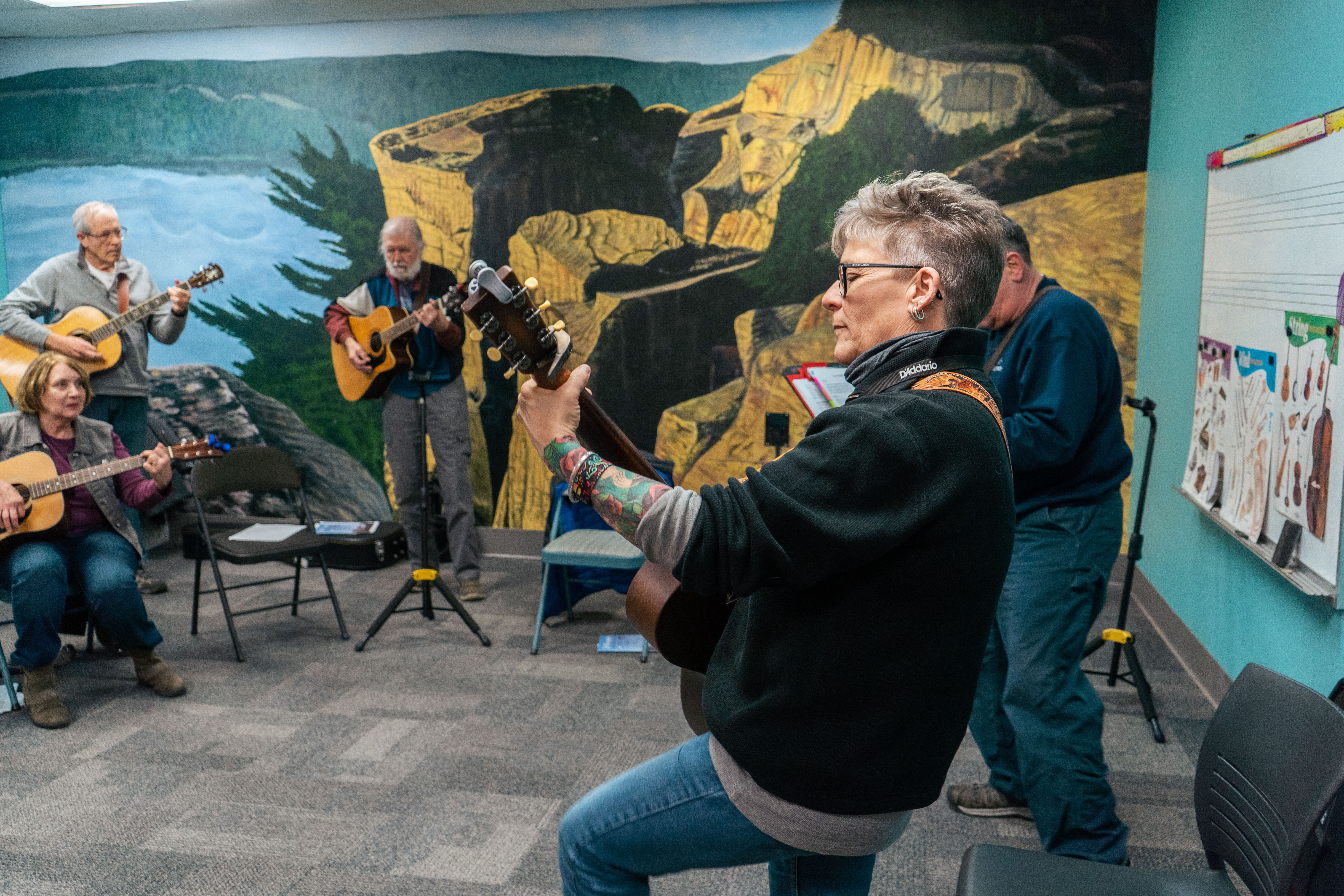 Have fun strumming and making music together with new friends at Heid Music!