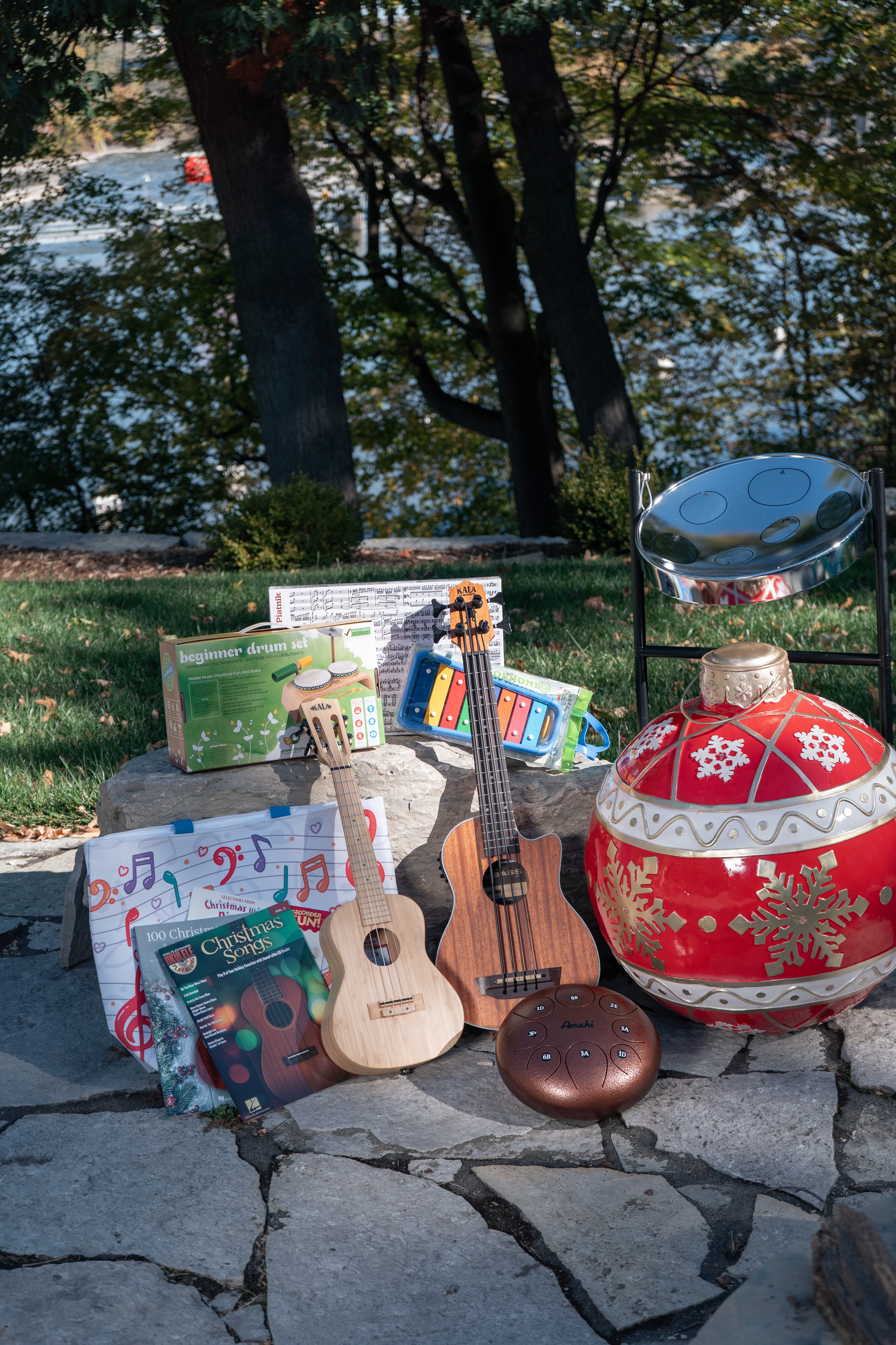 Christmas display with some ukuleles, childrens instruments, and percussion.