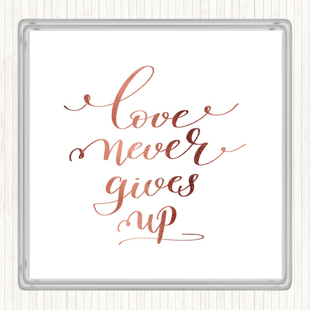 Rose Gold Love Never Gives Up Quote Coaster