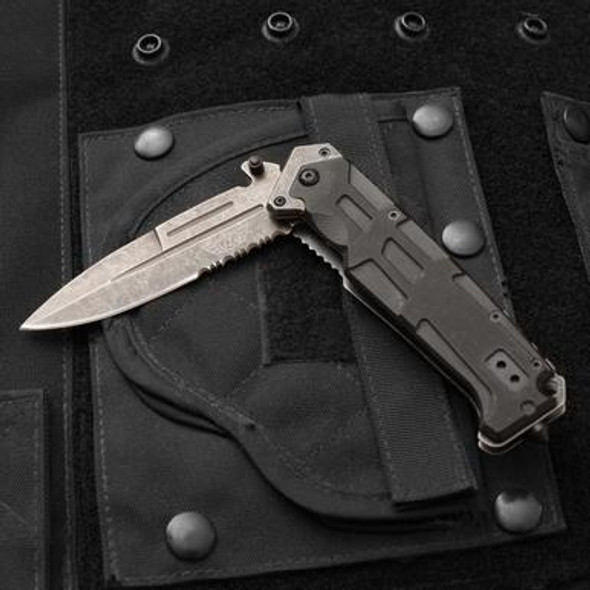 This UZI Stone Wash V Folding Knife is perfect for all your outdoor needs! UZI combines advanced technical concepts with innovative designs to produce products used and trusted by the Army, Secret Service and Special Forces. With it's serrated edge, stainless steel blade, G10 handle and metal pocket clip. The blade is stone washed and the black G10 handle offers added comfort and grip and a modern design. Spring Assist makes this knife easy to open.