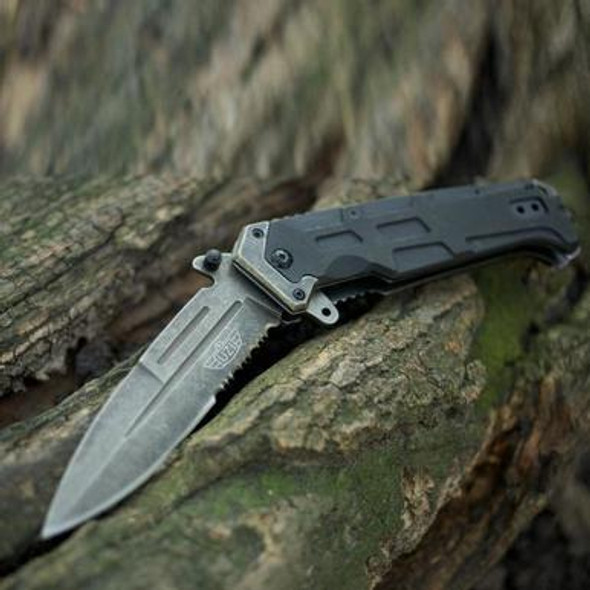This UZI Stone Wash V Folding Knife is perfect for all your outdoor needs! UZI combines advanced technical concepts with innovative designs to produce products used and trusted by the Army, Secret Service and Special Forces. With it's serrated edge, stainless steel blade, G10 handle and metal pocket clip. The blade is stone washed and the black G10 handle offers added comfort and grip and a modern design. Spring Assist makes this knife easy to open.