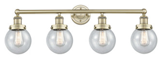 Edison Four Light Bath Vanity in Antique Brass (405|616-4W-AB-G204-6)
