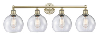 Edison Four Light Bath Vanity in Antique Brass (405|616-4W-AB-G124-8)