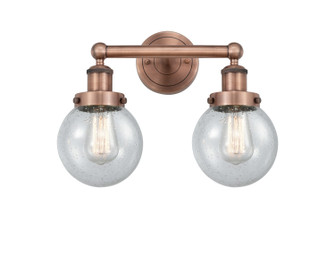 Edison Two Light Bath Vanity in Antique Copper (405|616-2W-AC-G204-6)