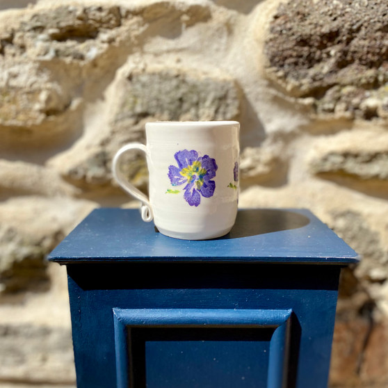 Ceramic mug with hand painted pansy design by Jane Elmer-Smith, Grange Gallery, Dorset