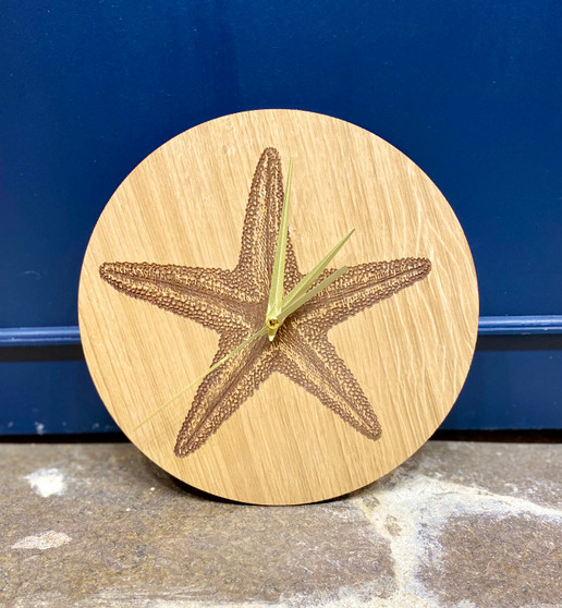 Starfish, engraved Oak wooden clock by Esme and Jason, Grange Gallery, Dorset