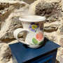 Ceramic jug, with  hand printed flowers on a white glaze by Jane Elmer-Smith, Grange Gallery