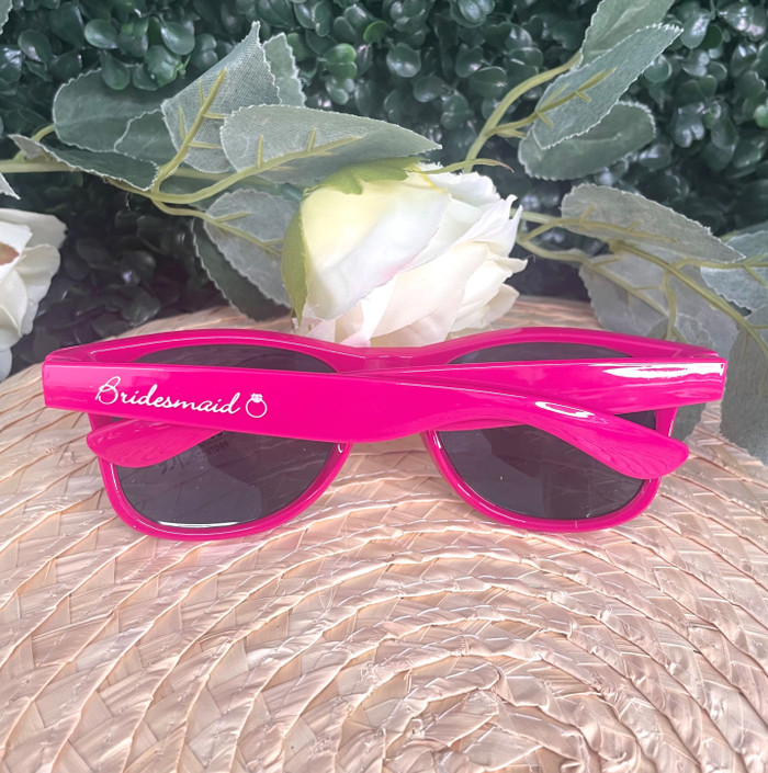 Sunglasses - Pink 'Bridesmaid' with white writing.