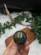 Labradorite Flashy Sphere for protection, intuition, and transformation. A beautiful polished crystal with striking natural flash.