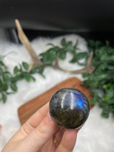 Labradorite Flashy Sphere for protection, intuition, and transformation. A beautiful polished crystal with striking natural flash.