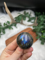 Labradorite Flashy Sphere for protection, intuition, and transformation. A beautiful polished crystal with striking natural flash.