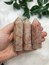 Wholesale set of 3 polished Sunstone points with peach and orange tones. Beautiful crystals for confidence, joy, vitality, creativity and uplifting energy.