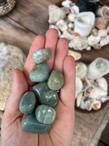 Aquamarine Tumbled Stone with soft ocean-blue tones. A calming crystal for courage, communication, throat chakra support, emotional balance and peaceful energy.