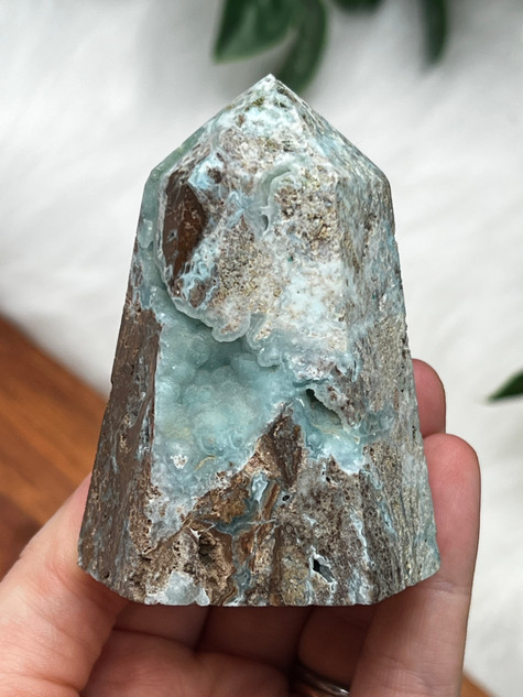Hemimorphite tower with soft blue tones, raw matrix and natural druzy pockets.