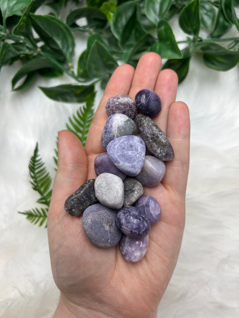 Small Lepidolite Tumbled Stone in soft purple tones. A calming crystal for stress, sleep, emotional balance, relaxation and gentle support through change.