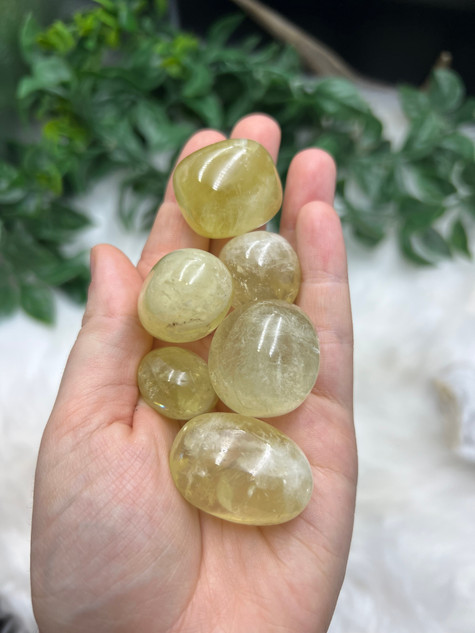 Lemon Quartz Tumbled Stone with soft golden-yellow tones. A bright crystal for clarity, confidence, luck, abundance, motivation, manifestation and positive energy.
