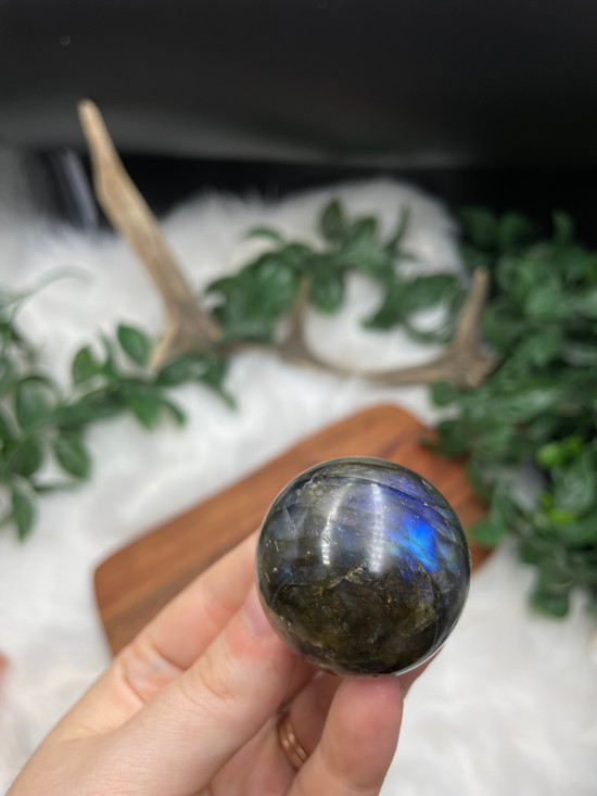 Labradorite Flashy Sphere for protection, intuition, and transformation. A beautiful polished crystal with striking natural flash.