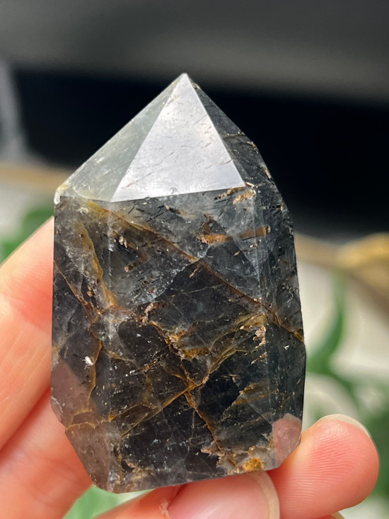 Actinolite in Quartz point for protection, grounding and energetic alignment.