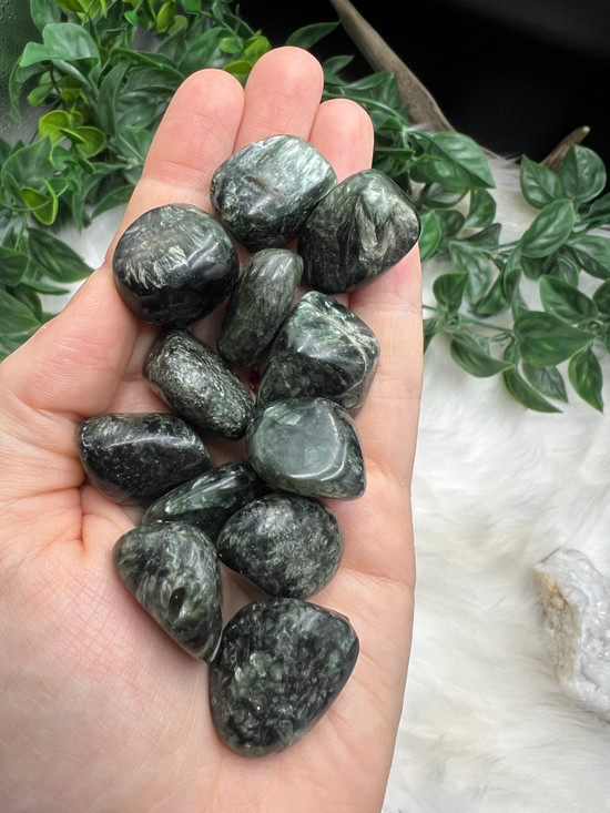 Seraphinite Tumbled Stone with shimmering silver-green feather patterns. A crystal for angelic connection, heart healing, spiritual growth, compassion and emotional renewal.