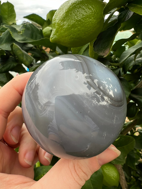 Grey Agate Sphere with calming, protective energy. A soothing crystal for balance, courage, emotional strength, self-confidence and peaceful grounding.