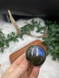 Labradorite Flashy Sphere for protection, intuition, and transformation. A beautiful polished crystal with striking natural flash.