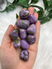 Stichtite Tumbled Stone with purple and green tones. A calming crystal for emotional awareness, protection, soul alignment, compassion and living as your true self.