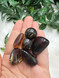 Sumatran Amber Tumbled Stone with deep golden brown tones. Fossilised tree resin for grounding, protection, stability, positive energy and creative self-expression.