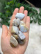 Blue Chalcedony Tumbled Stone with soft calming blue tones. A crystal for peaceful communication, emotional balance, throat chakra support, calm and gentle self-expression.