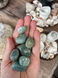 Aquamarine Tumbled Stone with soft ocean-blue tones. A calming crystal for courage, communication, throat chakra support, emotional balance and peaceful energy.