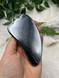 Terahertz gua sha tool with a sleek polished silver finish. A beautiful crystal beauty tool for facial massage, energy flow, clarity and mindful self-care rituals.
