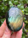 Labradorite palmstone for protection, intuition and transformation. A mystical crystal for energy shielding, spiritual awareness and inner magic.