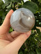 Grey Agate Sphere with calming, protective energy. A soothing crystal for balance, courage, emotional strength, self-confidence and peaceful grounding.