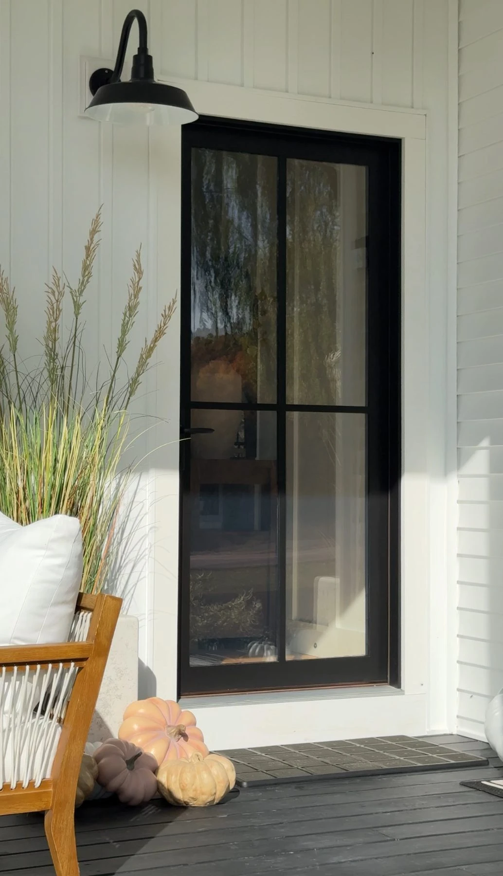 Customer porch with black full-lite door