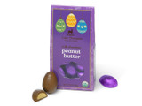 Milk chocolate peanut butter filled eggs wrapped in purple foils and packaged in an environmentally friendly Easter themed gift box, with wrapped and unwrapped chocolates eggs around the box. View Product Image
