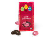Dark chocolate truffle filled Easter eggs wrapped in pink foils and packaged in a red and light pink Easter themed gift box, with wrapped and unwrapped eggs sitting outside of the gift box. View Product Image