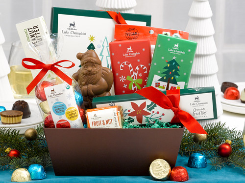 Assorted gourmet holiday chocolates made in Vermont inside a brown reusable gift basket. View Product Image